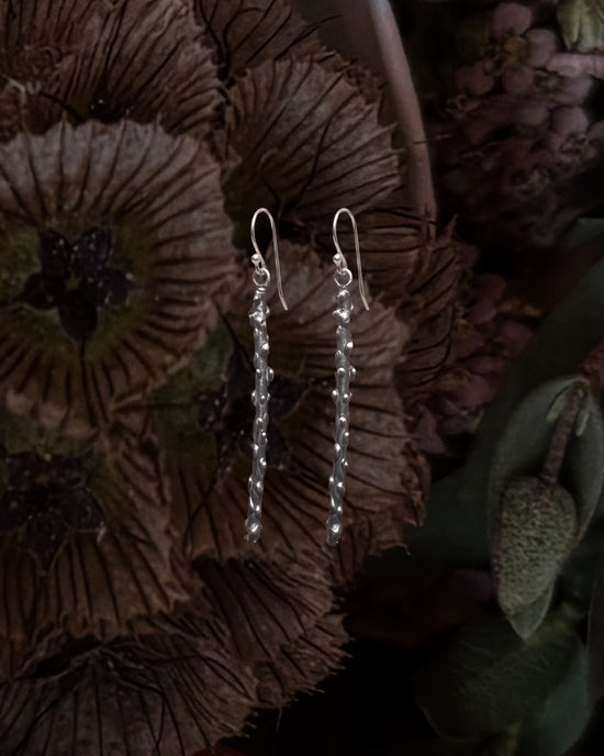 Aretes Tallo