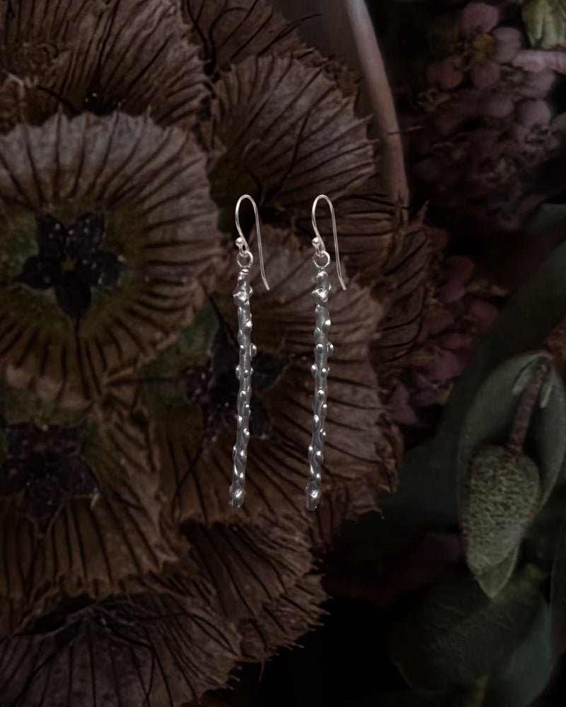 Aretes Tallo