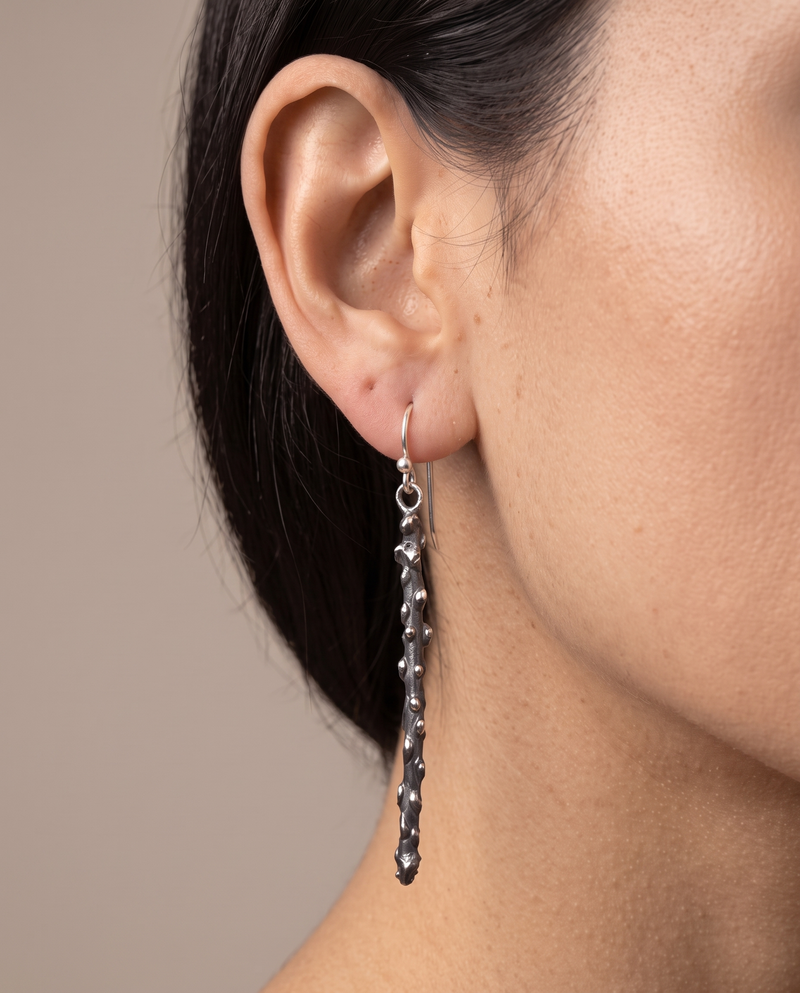 Aretes Tallo